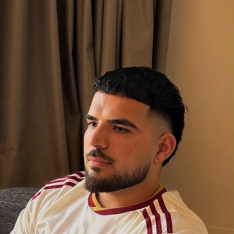Kam, barber at Kam's Fade